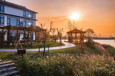 Caodang Homestay Отели рядом с достопримечательностью «Hengjinglao Jie Yingshi Base»