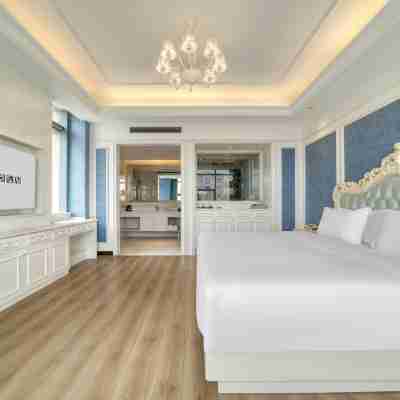 居卡曼花園酒店（靈湖景區店） Rooms