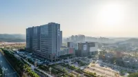 Boju International Apartment Hotel (Wanda Plaza) - Condos