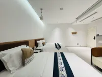 Miyou Smart Homestay (Xingyi Wanfenglin Airport South Railway Station)