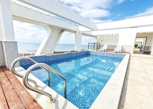 Haikou Lanxi She Pool Design Homestay (International Convention and Exhibition Center Holiday Beach) - เปิดใหม่