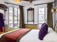 Le Village Montmartre โรงแรมใกล้โรงละครเลอตริอานง
