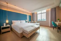 Nanxi Xiaozhou Hotel (Baili Square Xindacheng Branch)