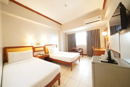 Palm Hotel Manila Отели рядом с достопримечательностью «National Library of the Philippines»