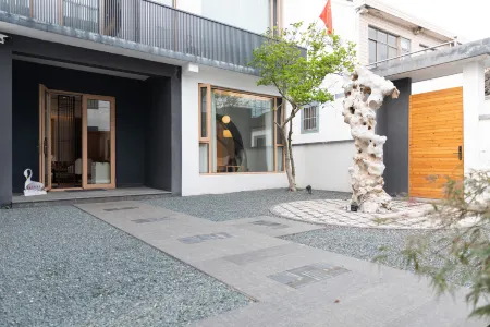 Xiangcun Qizhuang Hotel Отели рядом с достопримечательностью «Wenchang Pavilion»