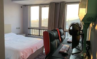 Feiduo E-sports Hotel (Tongshan Wanda Plaza)