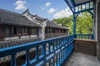 Yanguan Chaolezhicheng Baoren Apartment Отели в г. Хайнинг
