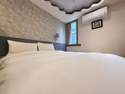 HomeyHouse 2 Inn Hotel dekat Ming Chuan University