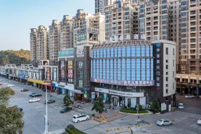 Jingxin Business Hotel Hotels near Guangdong Polytechnic College of Agriculture， Industry and Commerce (East to Qiaojian Lvye Mountain Villa)