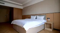 Xinlong Business Hotel (Huolinguole Hongyu Shopping Plaza Branch) Hotel di Holingol