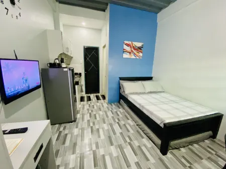 Amplayo Apartelle Studio Type Unit Отели рядом с достопримечательностью «Плаза Дивиория»