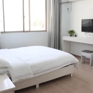 Huaining Shengli Hotel ( Citizen Square Duxiu Park)