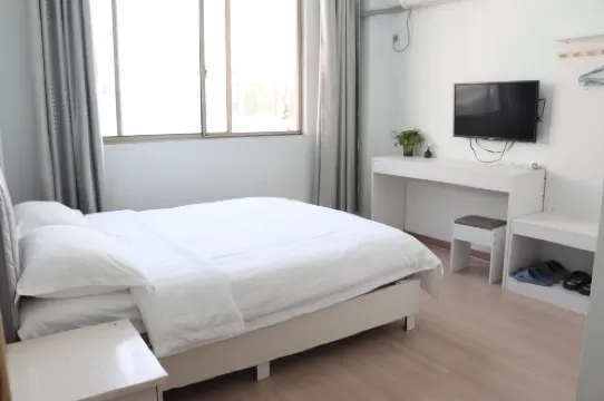 Huaining Shengli Hotel ( Citizen Square Duxiu Park)