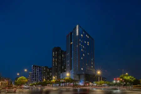 Huanlesong Hotel (Jiaxing Zhongguancun Wanli Square) Отели рядом с достопримечательностью «Jiaxing University South Area»