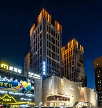 Shenyang Huanxi Hotel (Shenyang Olympic Sports Center Caixia Street Subway Station) Отели рядом с достопримечательностью «Shenyang Ligong University»