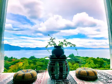 Huying Inn Fuxian Lake Отели в г. Хуанин