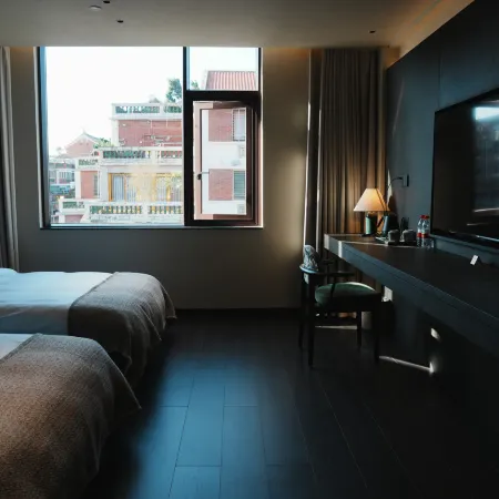 SlowHouse YueJian INN Отели рядом с достопримечательностью «Монастырь Кайюань»