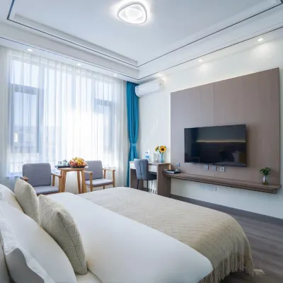 Lijiang Jinglin Hanshe Homestay (Sanyi International Airport) Hotels near صالة مطار سان إي