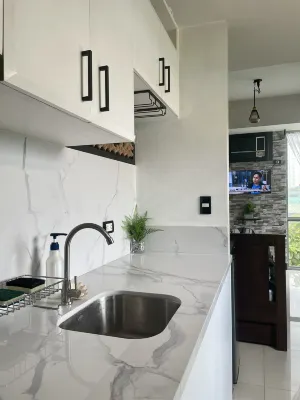 Kusela’s Haven – Budget-Friendly Relaxing Oasis with Garden View & Balcony Workspace - Condos