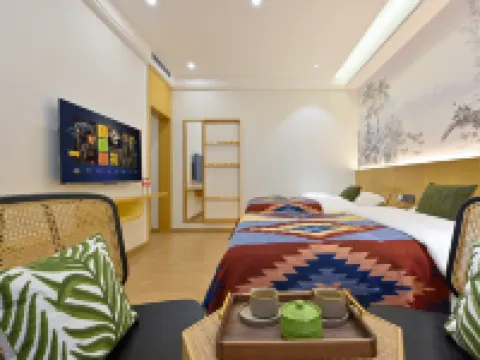 Qujing Boleg Yiju Hotel Hotel di Qujing