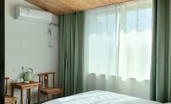 Lijia Xiaoyuan Homestay (Zhelinzhen Branch)