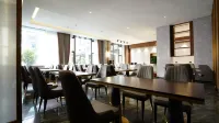 Qimen Qianxi Banquet Hotel - petit déjeuner