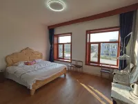Qiaojiaolou Homestay (China Mohe Food Street)