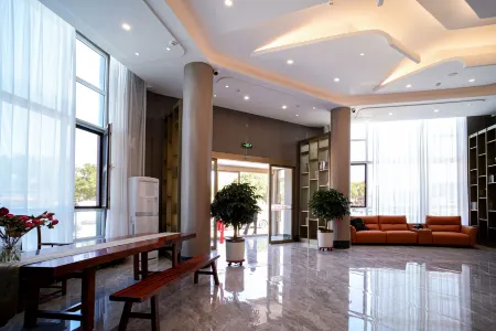Jindao   Holiday   Business   Hotel Отели рядом с достопримечательностью «Changxing Island»