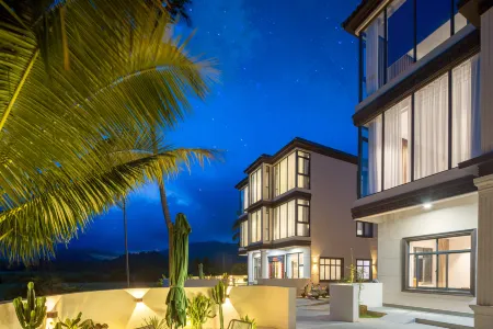 Twin Homestay (Wanning Shimeiwan Tourism Highway) Отели рядом с достопримечательностью «Huarun Shimeiwan Beach»