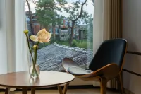 Yunting Huashe Garden Luxury Hotel (at Puzhehei Village Entrance Bus Station