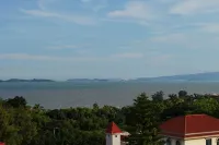 Xiamen Antiman · Resort Seaview Smart Audio-Visual Hotel (Huangcuo Beach) - con vista montagne