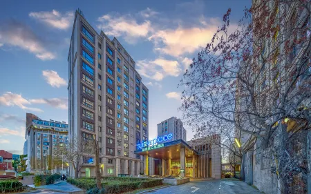 Suisse Place Hotel (TEDA MSD Branch, Binhai New Area, Tianjin) Отели рядом с достопримечательностью «Taida Financial Plaza E3AB»