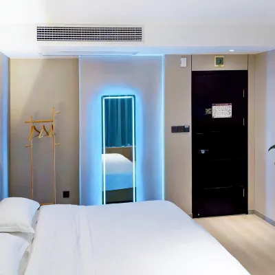 Xijing Business Hotel Hoteles cerca de Qianjiang Stadium
