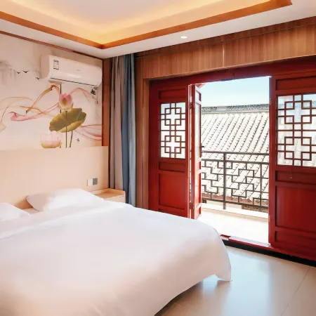 Shengshi Huiyao Hotel (Yi Ancient Town) Отели в г. Чусион
