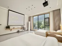Yunlanju · CloudMist | Family-Friendly Designer Scenic Boutique Stay (Baoquan Tourism Resort Area) - ที่มีบาร์