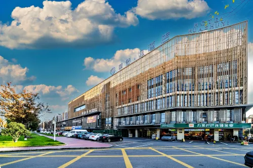 Huashuyi Hotel (Huzhou Zhili Wuyue Plaza China Children's Wear City) - فطور