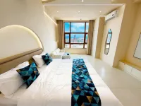 Yuechengju Homestay (Baicheng Railway Station Fortune Plaza) - Bãi đậu xe