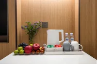 興義景峰飯店（夢樂城店） - 機場接送