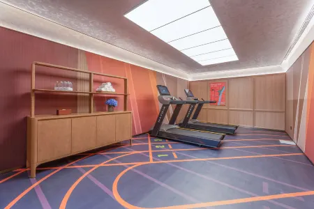 Orange Hotel (Xinyi South Railway Station Branch) Отели в г. Синьи