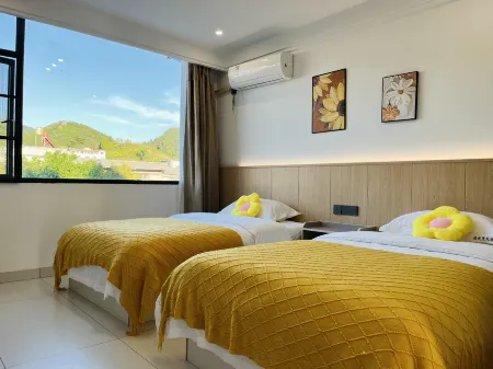 Wanfenglin Shiguangli Homestay Отели рядом с достопримечательностью «Fenglin Buyi Scenic Area»