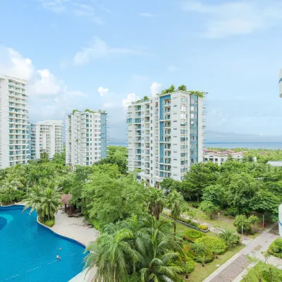 Coconut Wind Island Family Vacation Apartment (Sanya Dadonghai Half Mountain Peninsula Branch) 루후이터우 골프 코스 주변 호텔