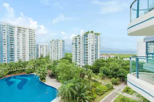 Coconut Wind Island Family Vacation Apartment (Sanya Dadonghai Half Mountain Peninsula Branch) - Condos