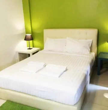 ห้องเตียงควีนไซส์พร้อมระเบียง