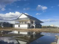 Qiaojiaolou Homestay (China Mohe Food Street)