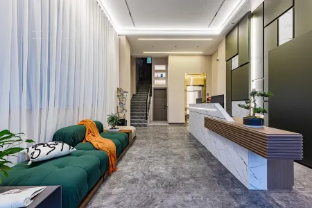 Luyu Intelligent Hotel (ASEAN International Used Car Trading Market Store) Отели рядом с достопримечательностью «Honghe Vocational and Technical College»