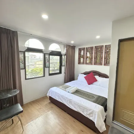 Longzhu Guesthouse Отели рядом с достопримечательностью «Asiatique - Набережная»