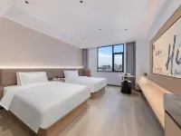 Qiyuli hotel（Haikou East railway station&modern women and children‘hospital） โรงแรมใกล้วัดอู๋กง