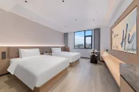 Qiyuli hotel（Haikou East railway station&modern women and children‘hospital）