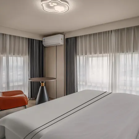 Mengdan International Hotel (Jiangmen Hetang Central Square Jinyi City Branch)
