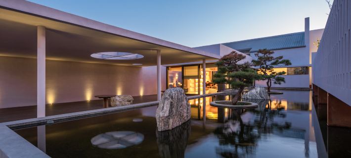 Purple House Koi Pond Courtyard Guesthouse Hotels in Tekes County
